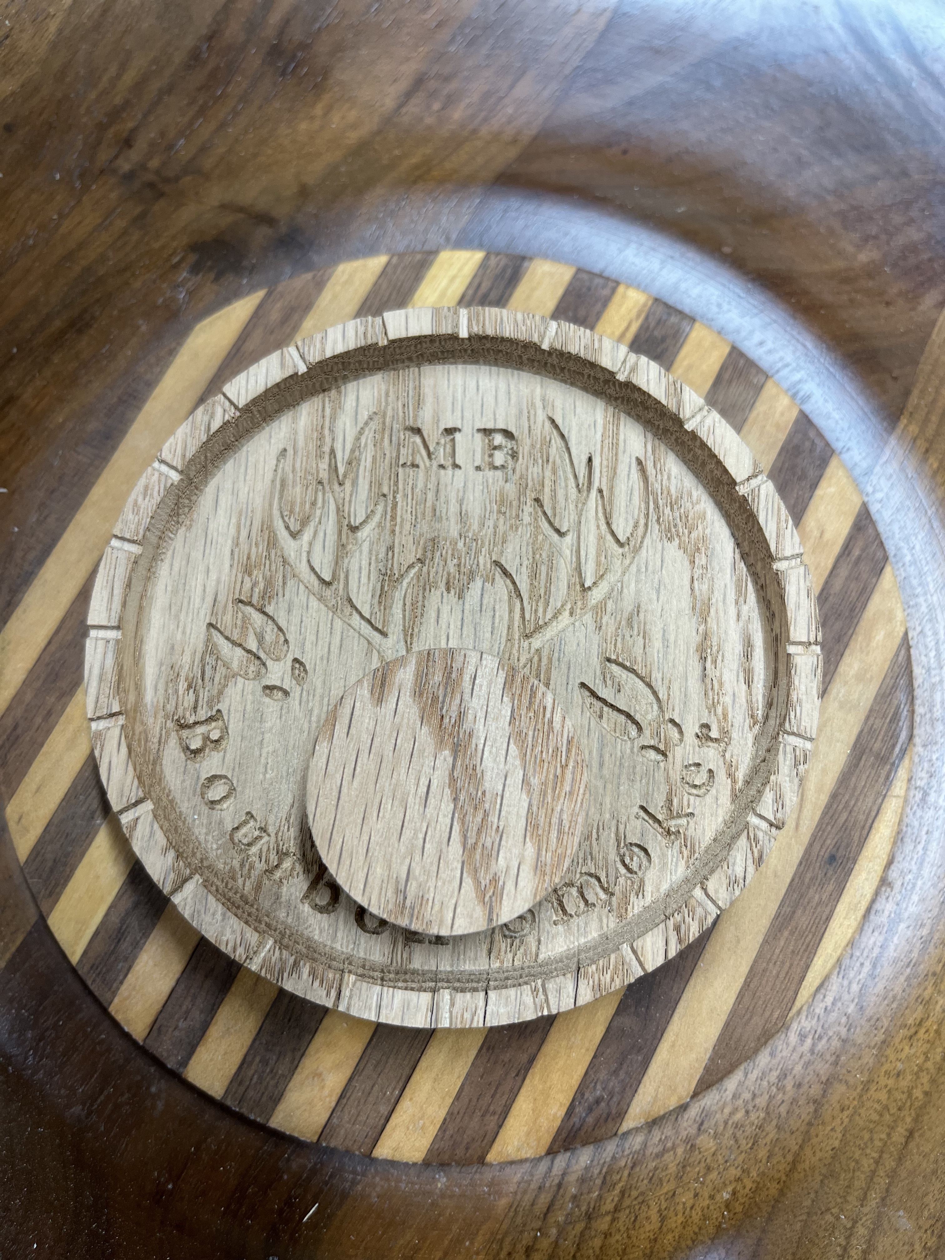 Bourbon Smoker CNC lid prototype with engraved design and smoke release port